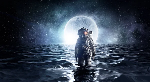 Spaceman in the sea. Mixed media — Stock Photo, Image