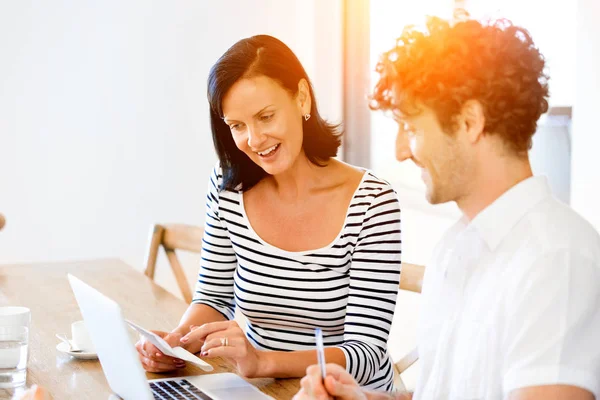 Happy modern couple working on laptop at home — Stock Photo, Image