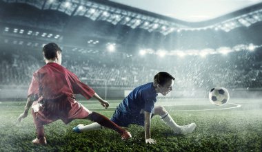 Çocuk futbol oynamak. Karışık teknik