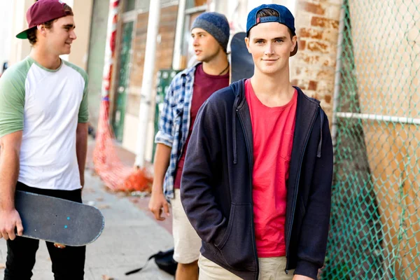 Teenage friends walking at the street — Stock Photo, Image