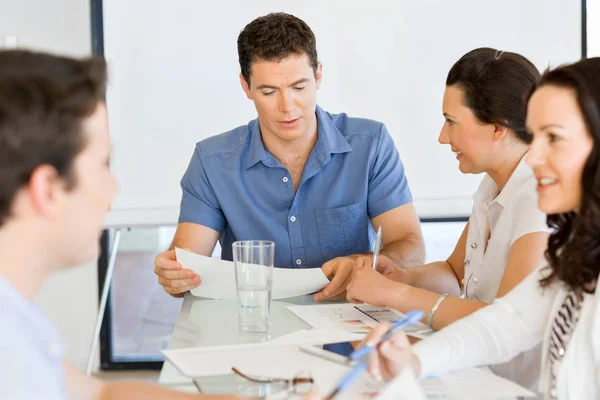 Image of business partners discussing documents and ideas — Stock Photo, Image