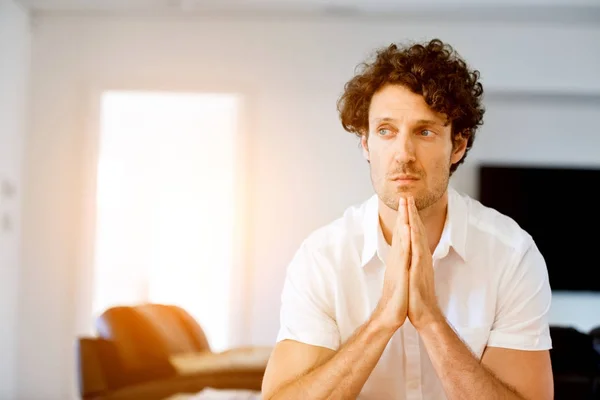 Portrait of a smart young man standing in kitchen — Stock Photo, Image