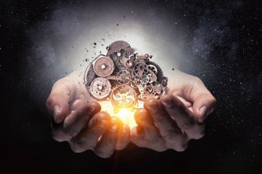 Dişli mekanizması elinde. Karışık teknik