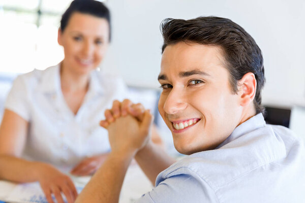 Young man in casual in office