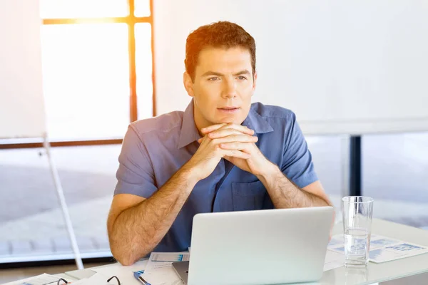 Pensive businessman at office — Stock Photo, Image