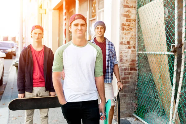 Teenage friends walking at the street — Stock Photo, Image