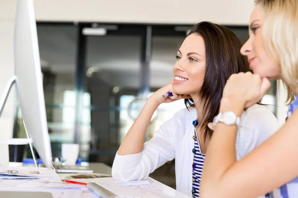 Image of two young business women in office — Stock Photo, Image