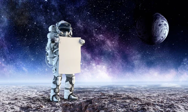 Raumfahrer mit Banner. Gemischte Medien — Stockfoto