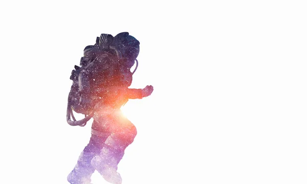 Kosmonaut na bílém pozadí. Kombinovaná technika — Stock fotografie