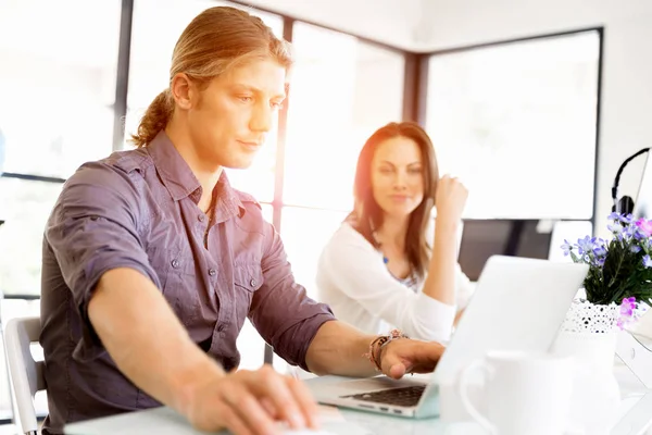 Handsome businessman working at computer — Stock Photo, Image