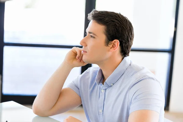 Pensive businessman at office — Stock Photo, Image