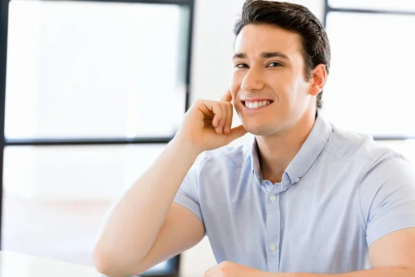 Young man in casual in office — Stock Photo, Image