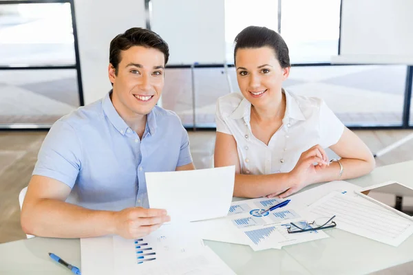 Image of two young business people in office — Stock Photo, Image