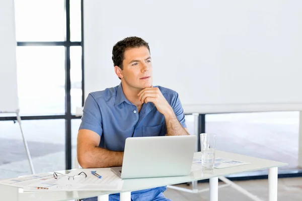 Pensive businessman at office — Stock Photo, Image