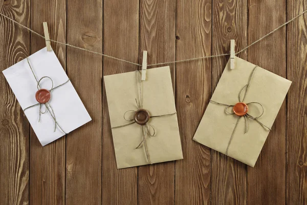 Envelopes pinned to rope — Stock Photo, Image