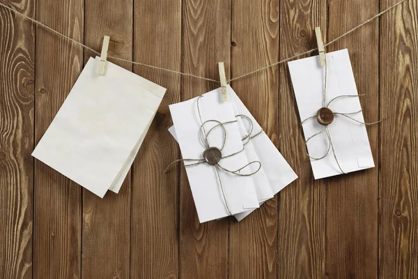 Envelopes pinned to rope — kuvapankkivalokuva