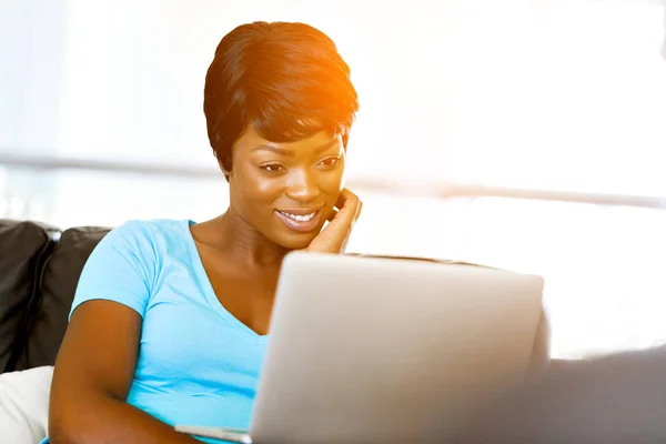 Young beautiful woman working on her laptop — Stock Photo, Image