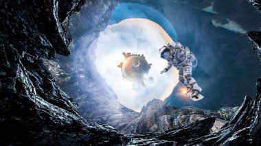 Uzay delik ve astronot. Karışık teknik