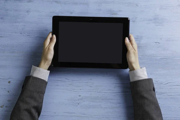 Lady boss using tablet device — Stock Photo, Image