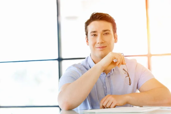 Pensive businessman at office — Stock Photo, Image