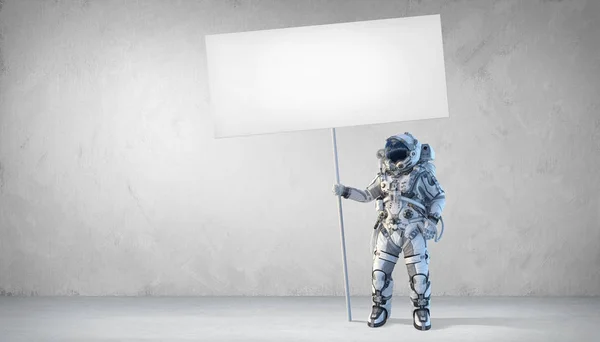 Spaceman met banner. Mixed media — Stockfoto