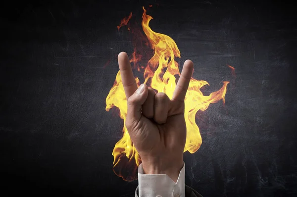 Fire burning in his hands — Stock Photo, Image