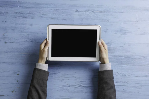 Lady boss using tablet device — Stock Photo, Image