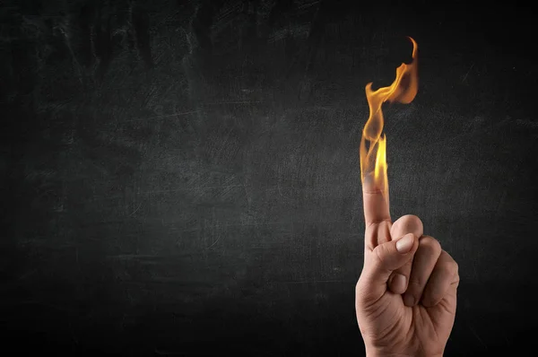 Fire burning in his hands — Stock Photo, Image