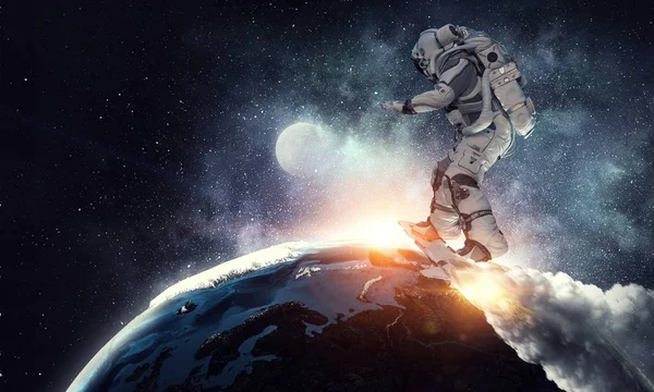 Un astronauta a bordo. Medios mixtos —  Fotos de Stock
