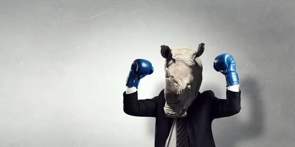 Rhino dressed in business suit . Mixed media — Stock Photo, Image