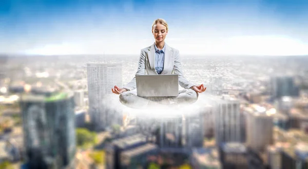 Woman float above city — Stock Photo, Image