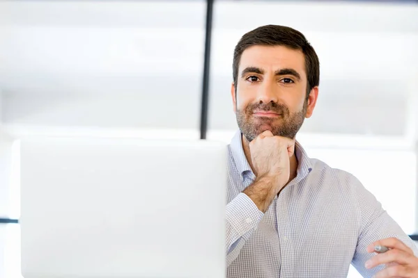 Pensive businessman at office — Stock Photo, Image