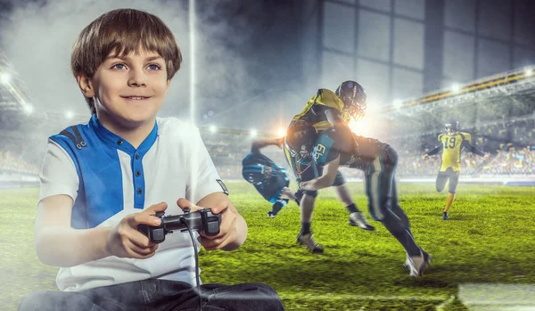 Boy playing a video game. Mixed media — Stock Photo, Image
