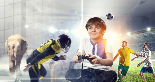 Boy playing a video game. Mixed media — Stock Photo, Image