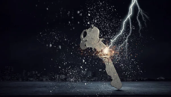 Lightning striking key. Mixed media — Stock Photo, Image