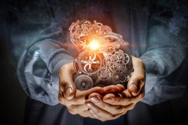 Dişli mekanizması elinde. Karışık teknik