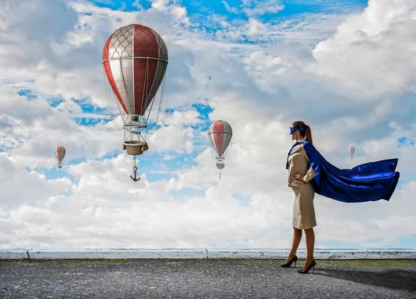 Strong and powerful as super hero . Mixed media — Stock Photo, Image