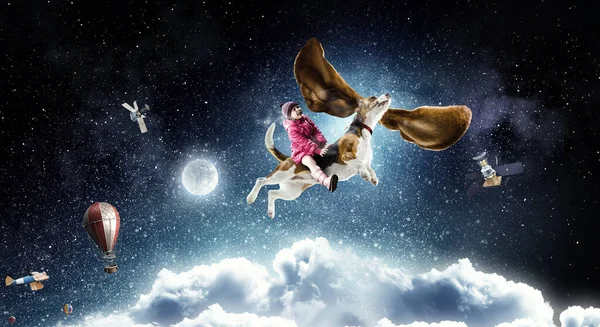 Super hero and her flying dog — Stock Photo, Image