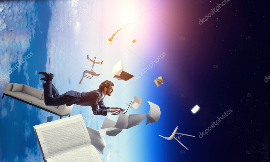 Man flies and works on laptop. Mixed media