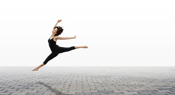 Chica gimnasta en salto Técnica mixta —  Fotos de Stock