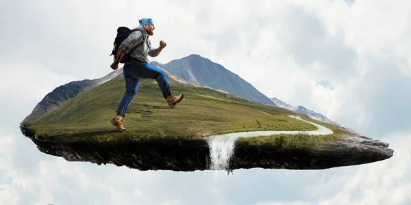 Hiker man med pinnar. Mixed media — Stockfoto