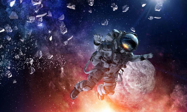 Astronaut on space mission. Mixed media — Stock Photo, Image