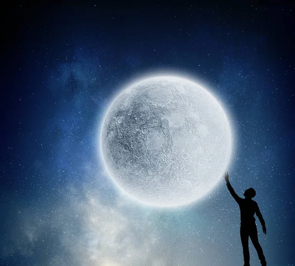 Reaching the moon. Mixed media — Stock Photo, Image