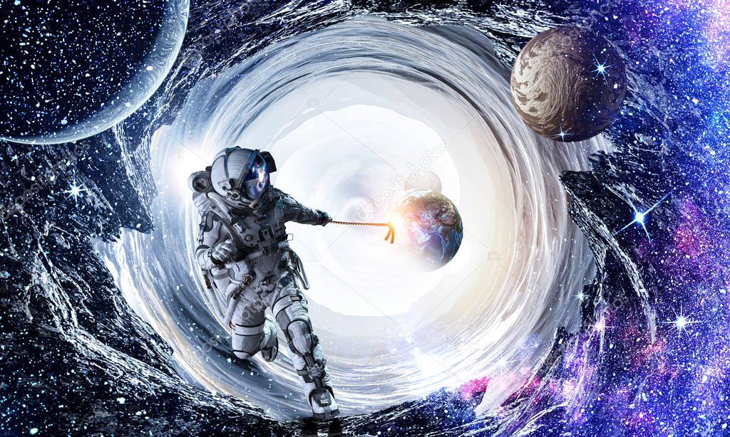 Fantasy image with spaceman catch planet. Mixed media