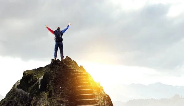 Hiker man in mountains. Mixed media — Stock Photo, Image