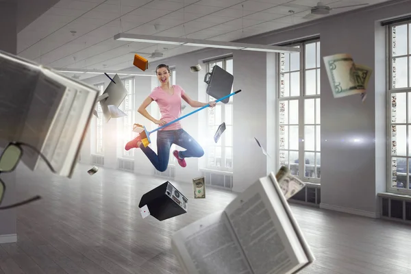 Woman doing funny cleaning. Mixed media — Stock Photo, Image