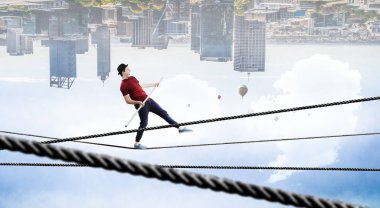 Cesur ropewalker kablosu üzerinde. Karışık teknik