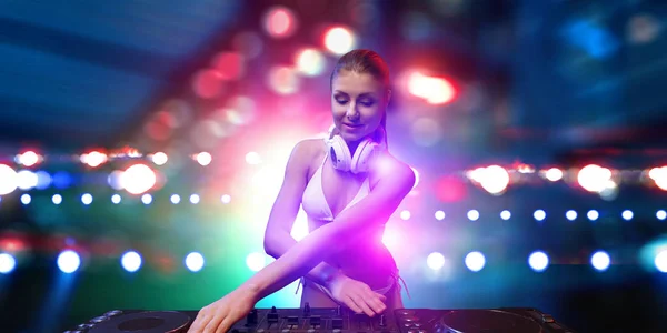 Cute dj woman at console. Mixed media — Stock Photo, Image