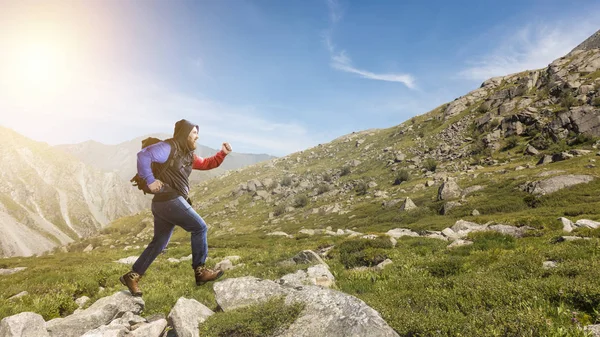 Hiker man with sticks. Mixed media — Stock Photo, Image