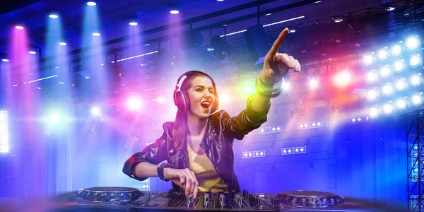 Female dj in nightclub. Mixed media — Stock Photo, Image